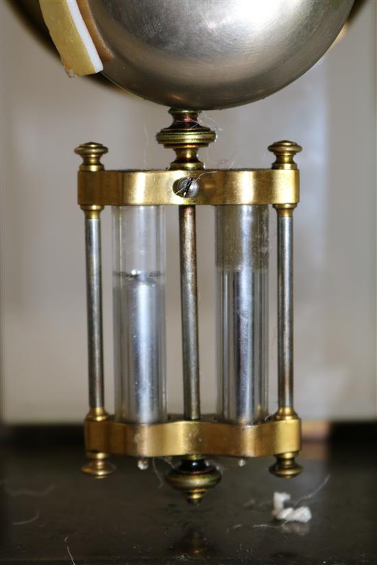 An Edwardian brass four glass mantel clock, 11in.